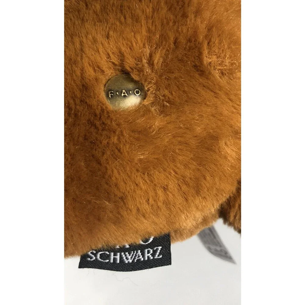 2021 FAO Schwarz Cheers 4 Love Wear & Share Red Ribbon Brown Dog